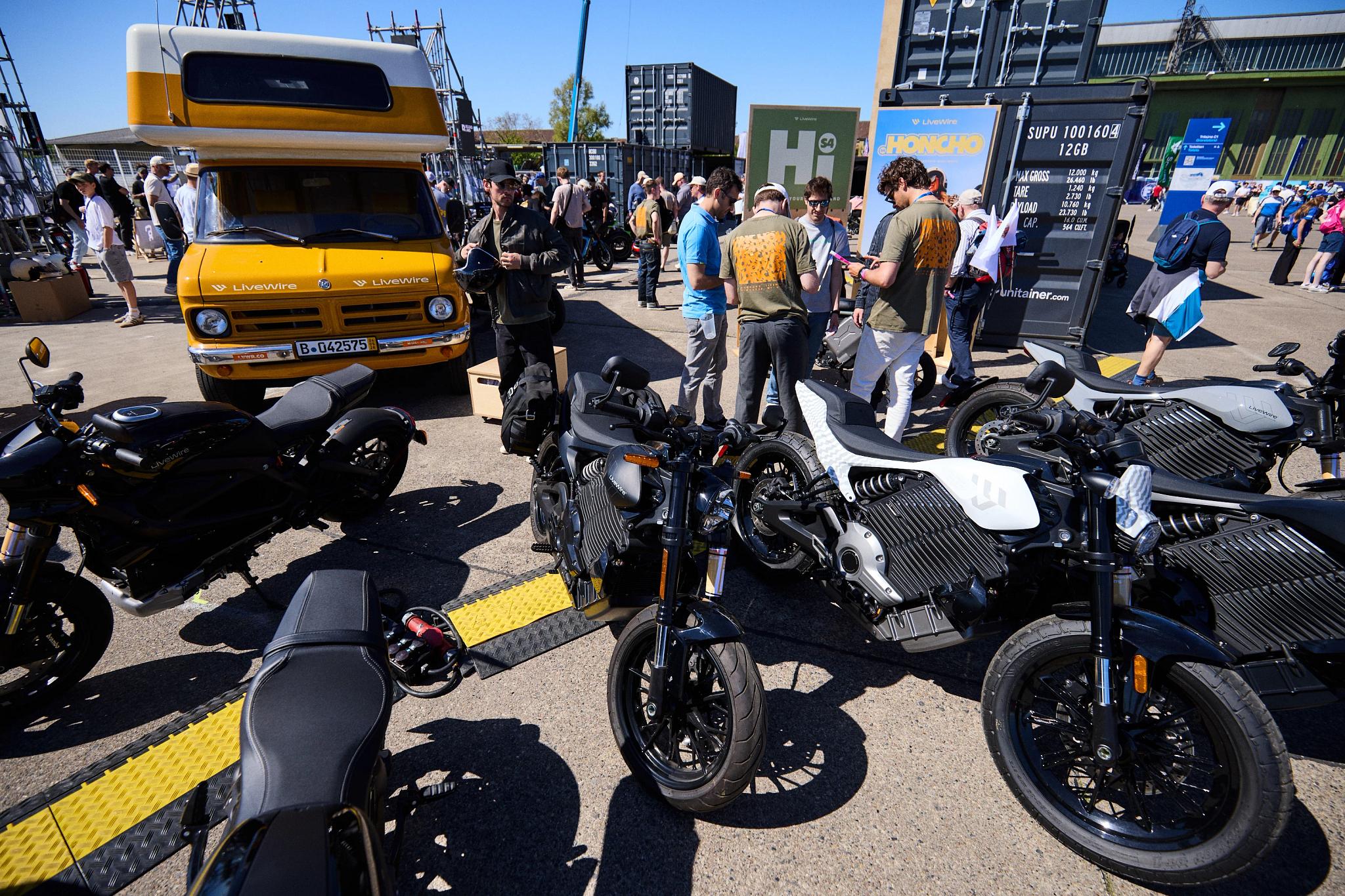 pulse, news, events, reload land 2026, berlin, honcho events, bike, street, vehicle, people, road, city, transportation system, biker, wheel, motorbike, seated, motor vehicle, car, drive, urban, public show