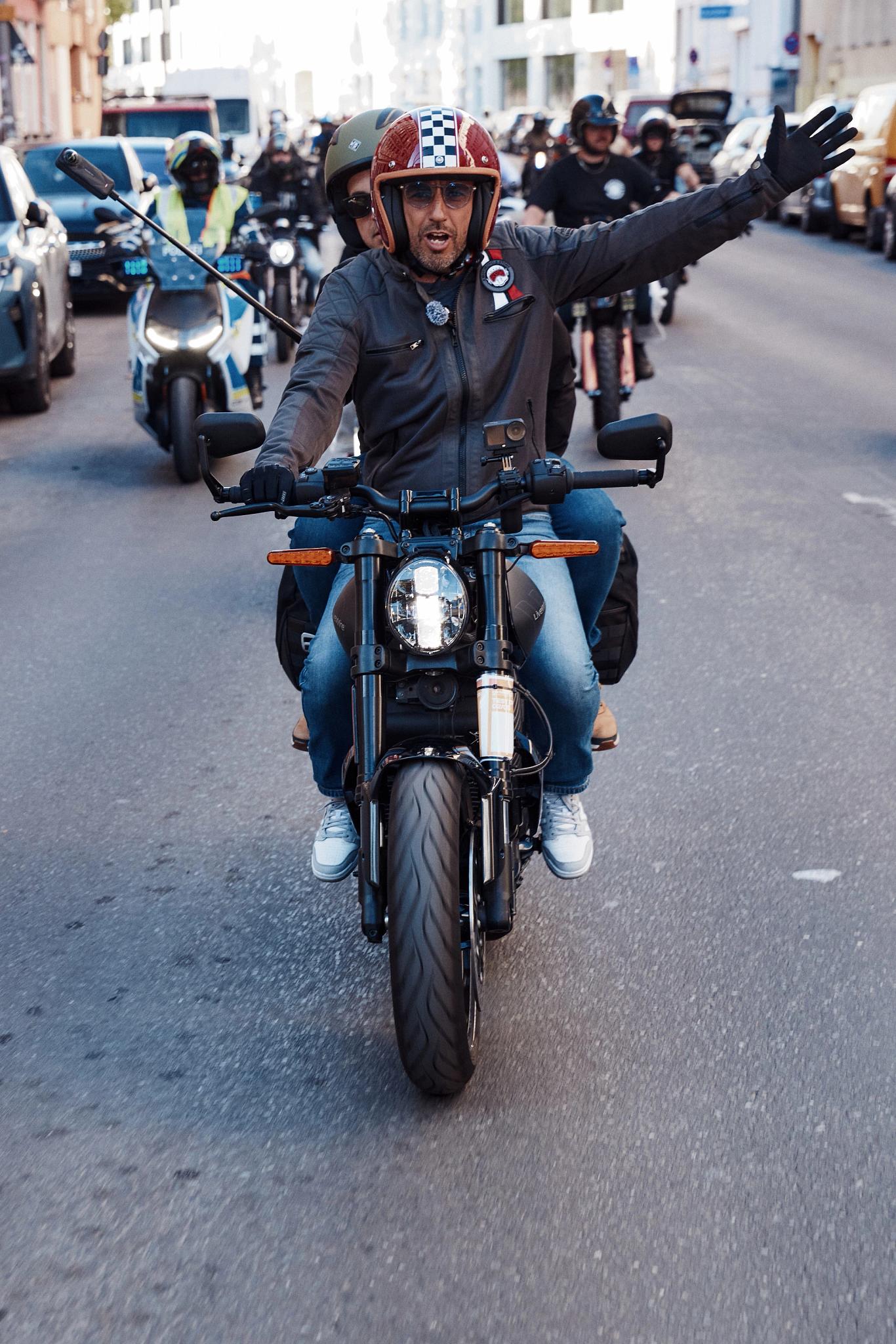 pulse, news, events, reload land 2026, berlin, honcho events, bike, street, people, vehicle, road, biker, seated, wheel, transportation system, motorbike, motor vehicle, man, city, police, helmet, cyclist