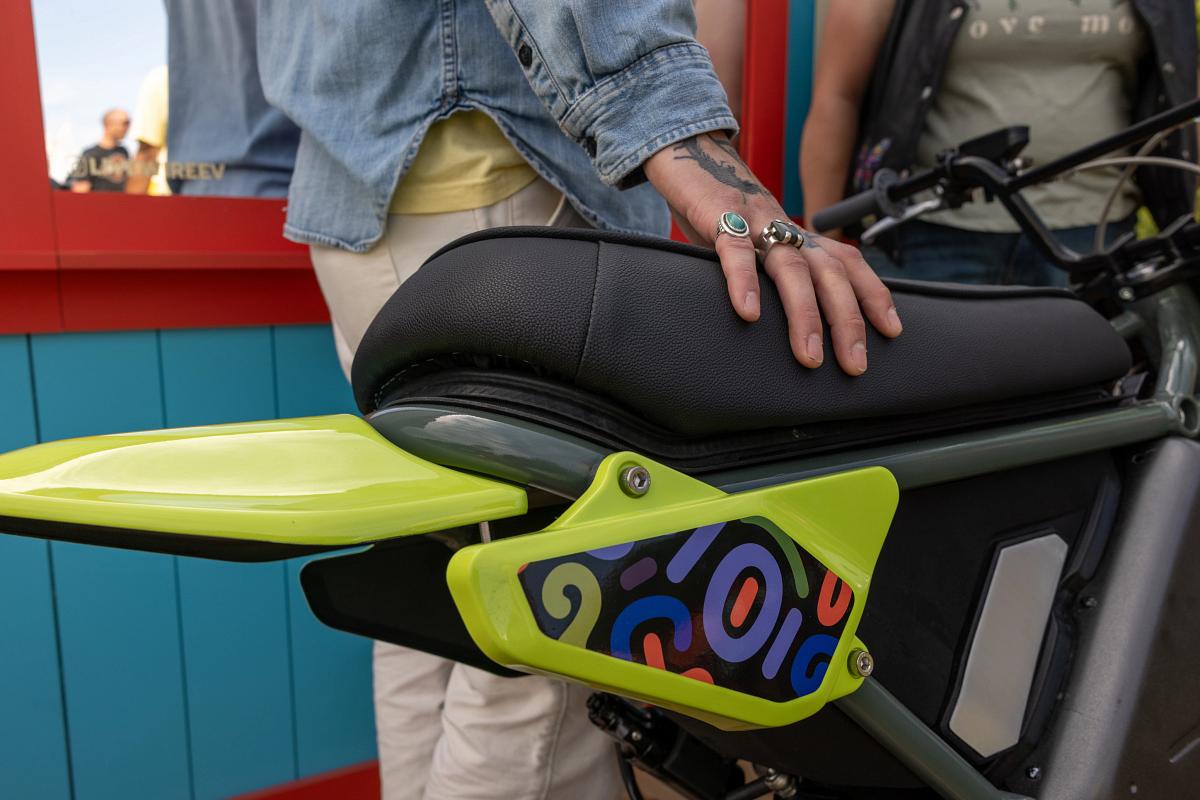 car, bike, vehicle, seated, girl, people, street, woman, portrait, transportation system, outdoors