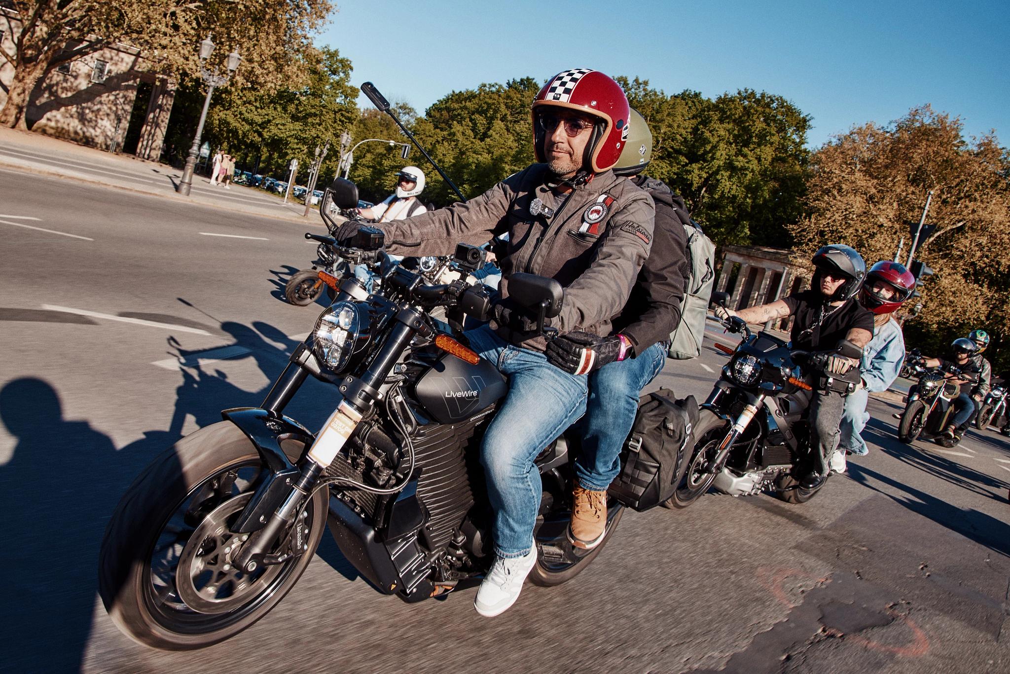 pulse, news, events, reload land 2026, berlin, honcho events, bike, biker, motorbike, wheel, rider, seated, street, people, road, helmet, vehicle, motorcyclist, hurry, motocross, cyclist, ride, man, race, sport, drive, motor vehicle, fun, couple, transportation system