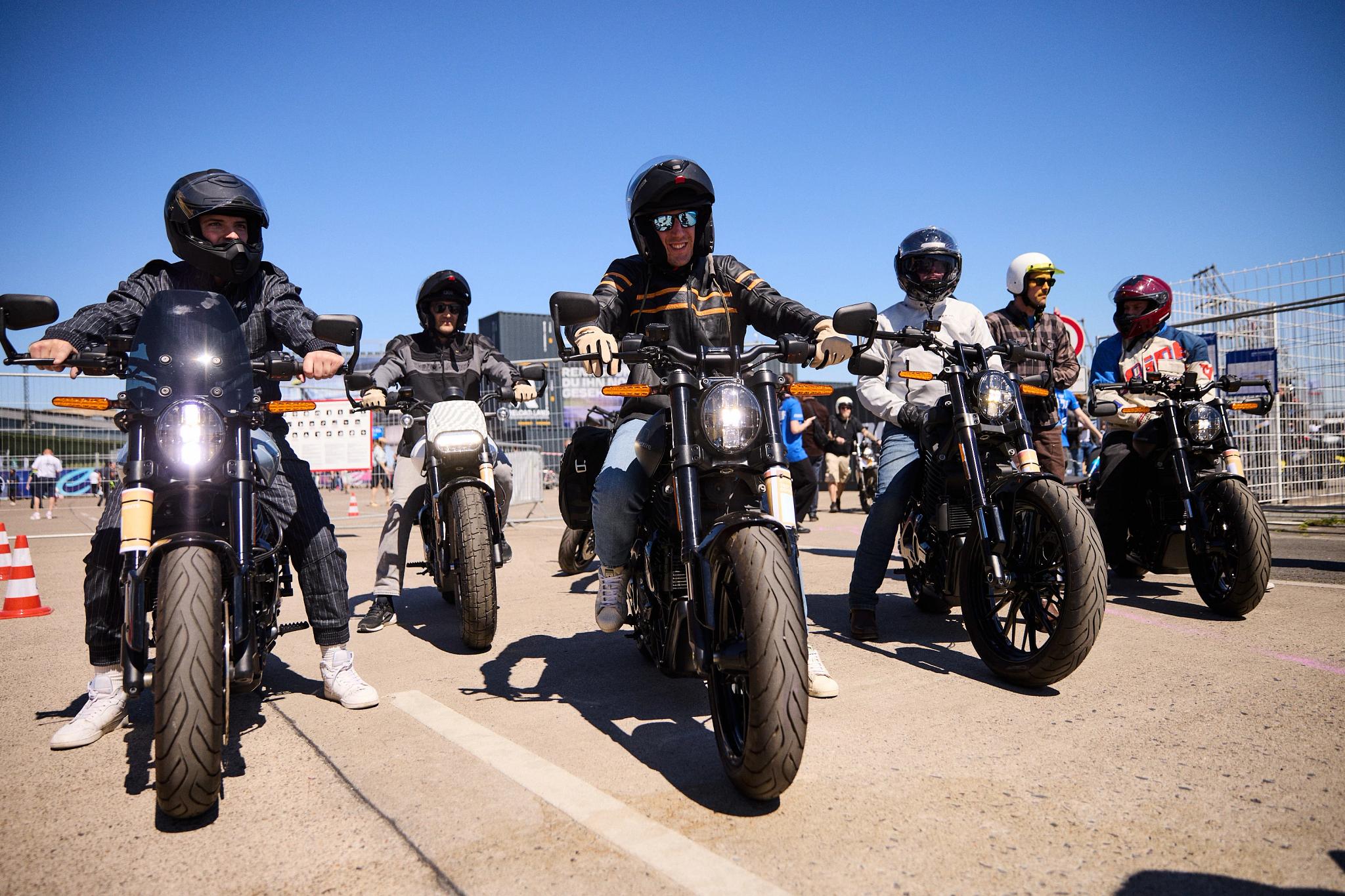 pulse, news, events, reload land 2026, berlin, honcho events, bike, people, vehicle, motorbike, man, biker, road, motor vehicle, seated, rider, race, street, helmet, track, machine, ride, competition, group together