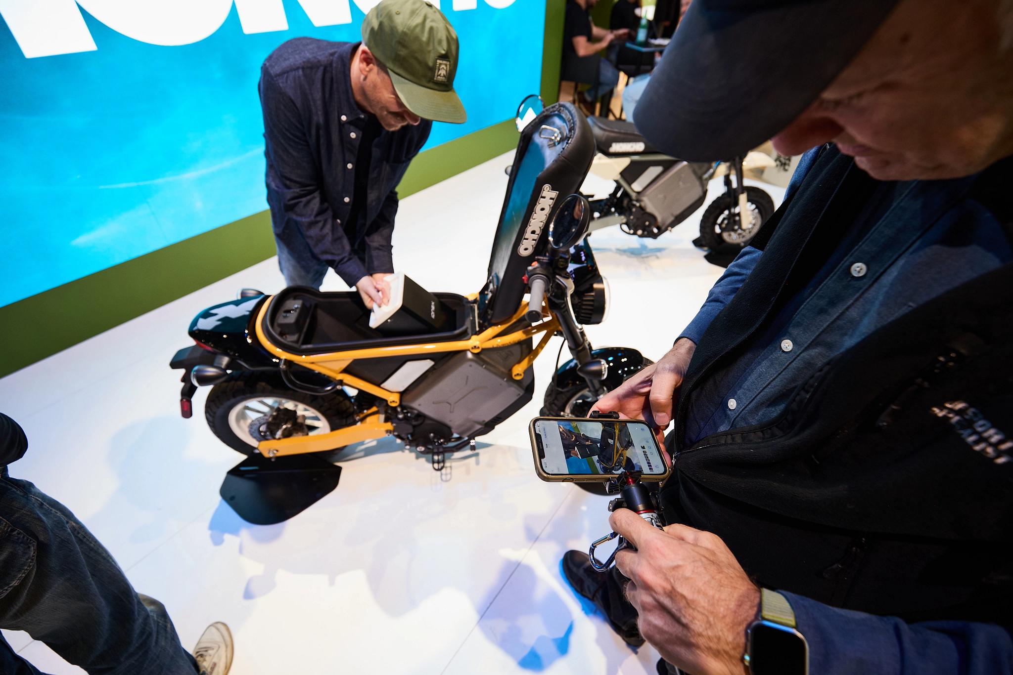 pulse, news articles, eicma, 2025, stacyc 10 year, s2 alpinista corsa, s4 honcho, alpinista patrol, maxi scooter, man, industry, people, vehicle, competition, bike, adult, woman