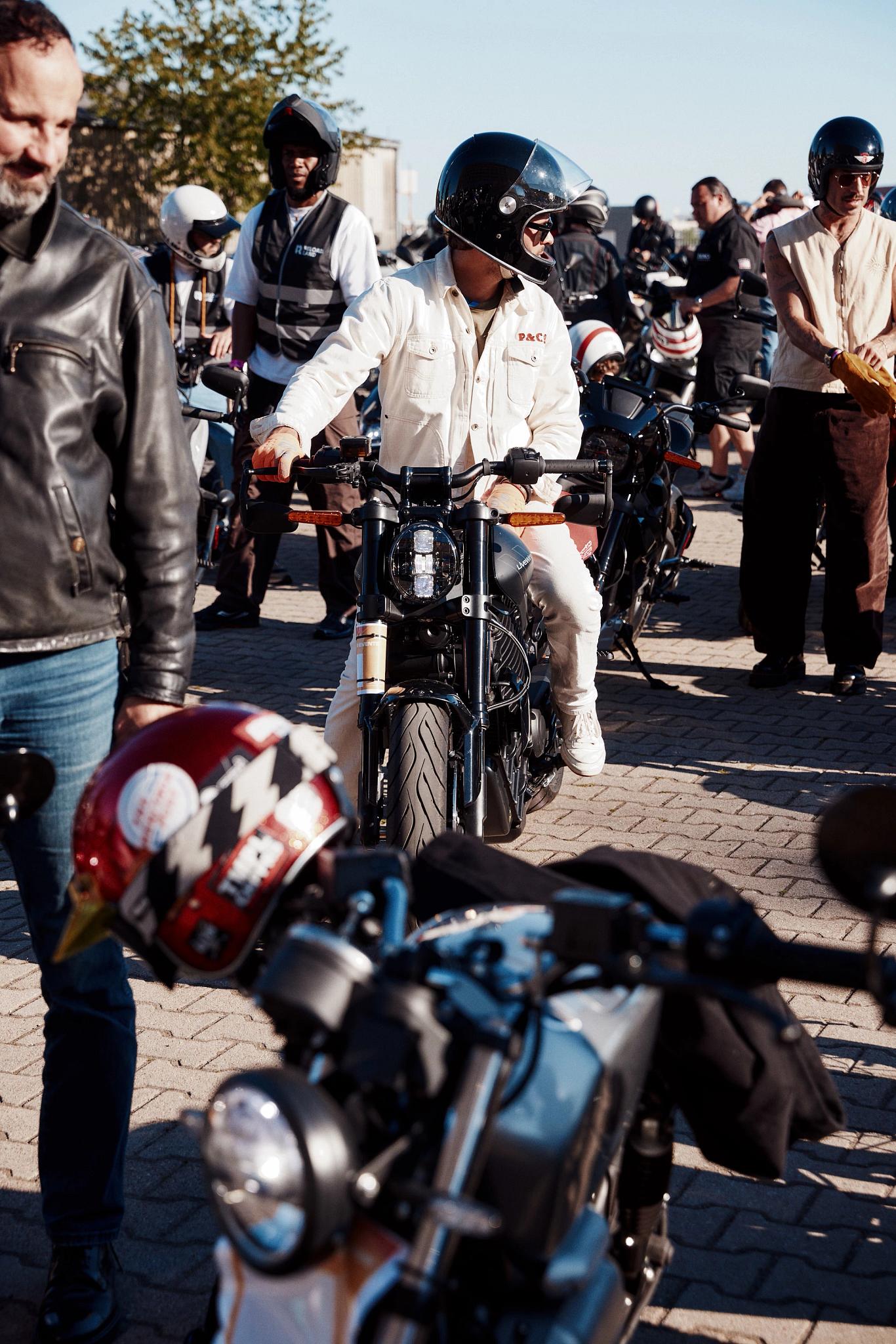 pulse, news, events, reload land 2026, berlin, honcho events, bike, street, people, city, road, biker, north america, urban, police, vehicle, man, motor vehicle, seated