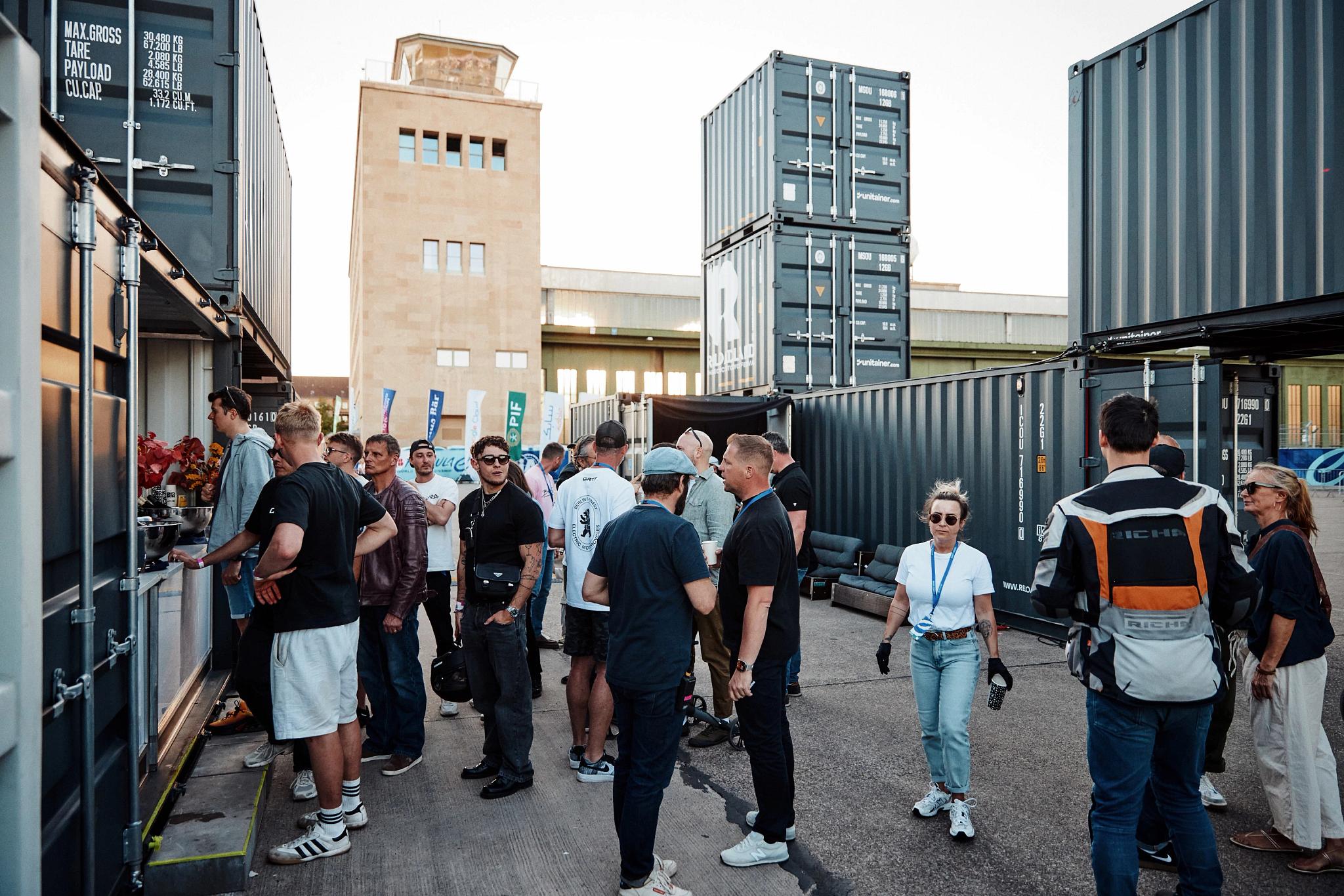 pulse, news, events, reload land 2026, berlin, honcho events, street, people, city, group, man, urban, north america, woman