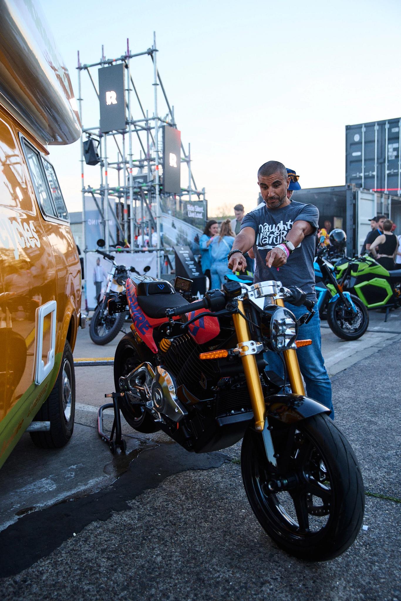 pulse, news, events, reload land 2026, berlin, honcho events, bike, people, street, vehicle, wheel, road, man, transportation system, city, biker, race