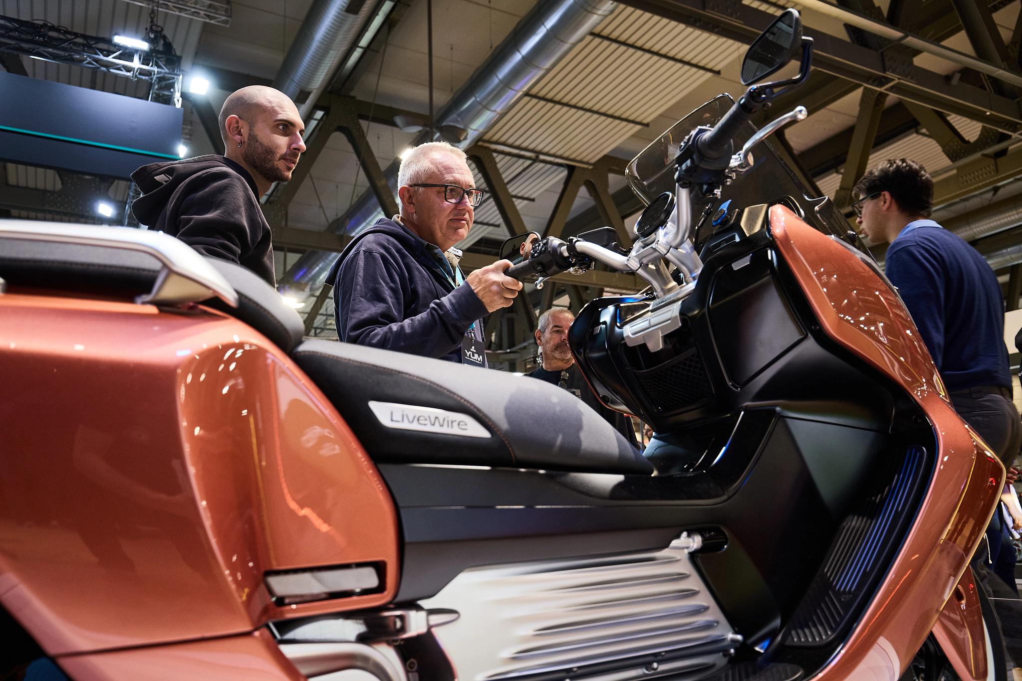 pulse, news articles, eicma, 2025, stacyc 10 year, s2 alpinista corsa, s4 honcho, alpinista patrol, maxi scooter, car, exhibition, automotive, bike, vehicle, transportation system, public show, drive, man, competition